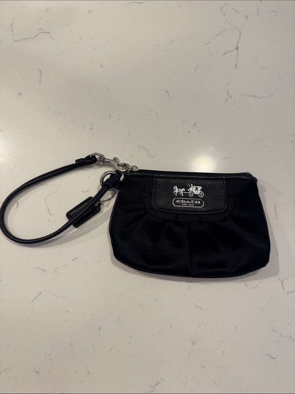 Coach Black Wristlet with Silver Logo Plaque